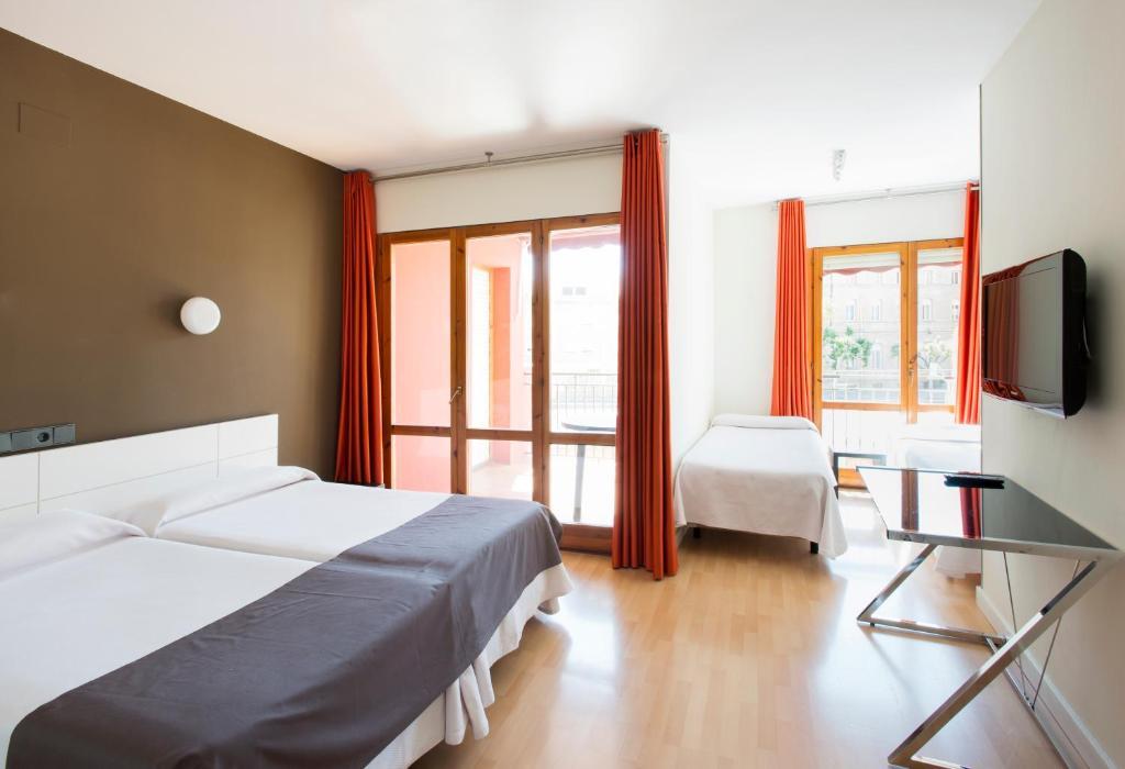 Hospedium Hostal Un Punto Chic Huesca Eksteriør billede